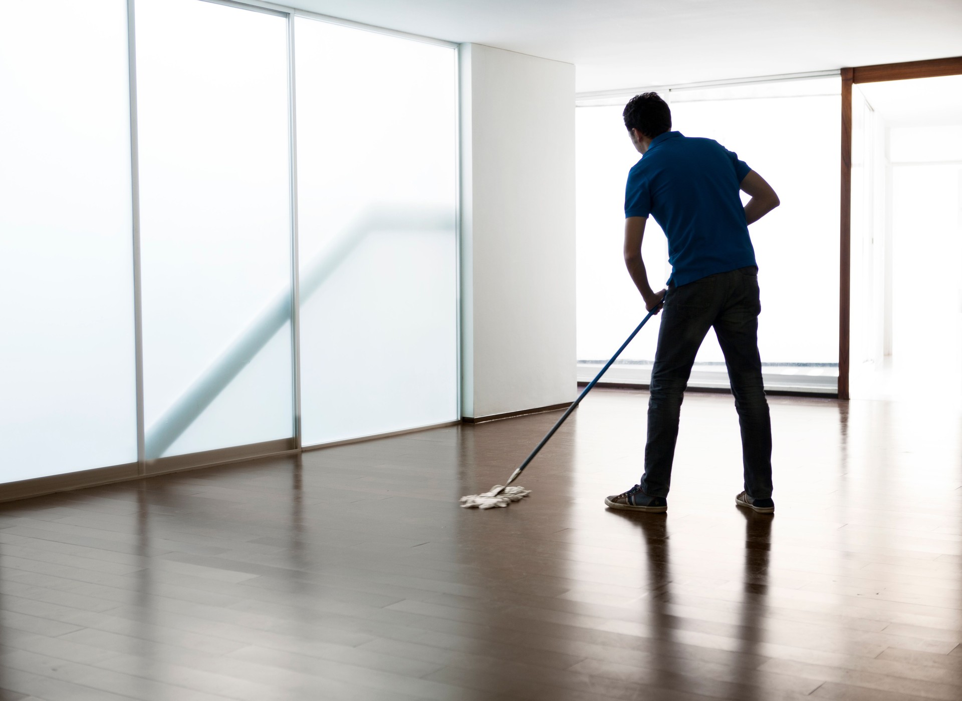 Man cleaning the floor